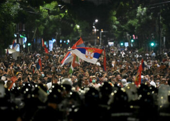 Serbian leader digs in, slams early elections rally