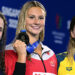 McIntosh powers to third gold of worlds, 12-year-old Yu fourth