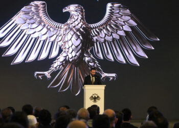 Syria's interim President Ahmad Al-Sharaa delivers a speech