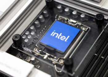 US chip maker Intel says revenue rose as it cut ranks
