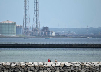Workers at stricken Fukushima nuclear plant evacuate after tsunami warning: operator