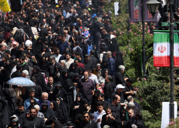 Iran says negotiating with 'all our might' to prevent sanctions snapback