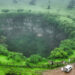 Mind the gap: tourists drawn to Oman's giant sinkholes