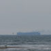 Two injured and ship set ablaze by projectile off Yemen