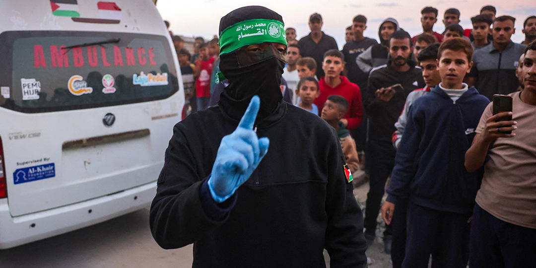 Hamas says postponing hostage body handover due to Israeli truce 'violations'