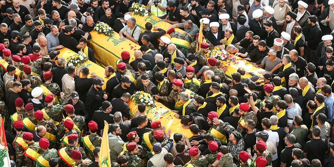 Hundreds in south Lebanon mourn Hezbollah members killed in Israeli attacks