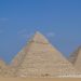 Monumental art displayed in shade of Egypt's pyramids
