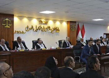 Iraq top judge says armed factions to cooperate on weapons