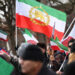 Iranians protest in Tehran as clashes grip country's west