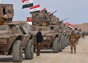 US Begins Transfer of Thousands of IS Prisoners from Syria to Iraq for Trial