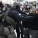 White House says US law enforcement face 'organized attack' after ICE shooting