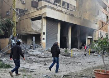 Israel renews strikes on Beirut suburbs, kills Lebanese soldier