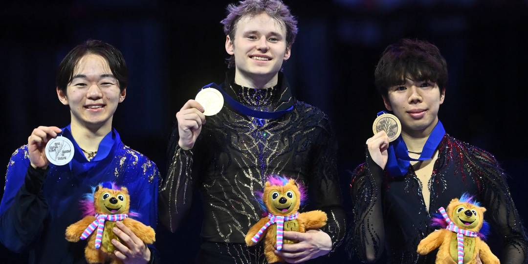 Malinin wins third world title