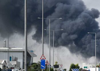 Thick black cloud of smoke over Doha after explosions: AFP journalist